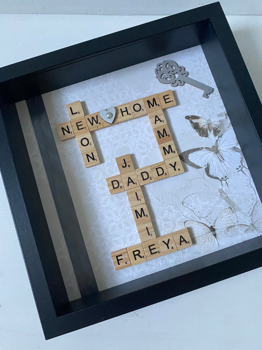 "Welcome the whole family to their new home with our personalised scrabble frame featuring the names of all its members. A unique and memorable housewarming gift that will bring a smile to their faces. Simply specify the names and we'll take care of the rest!"