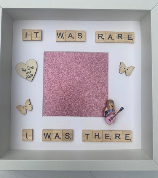 Make memories last with this Taylor Swift Lego frame! Featuring the iconic phrase "it was rare I was there," this frame is the perfect addition to any Swiftie's room. Showcase your favorite concert photo and keep the memories alive with this playful and unique frame.