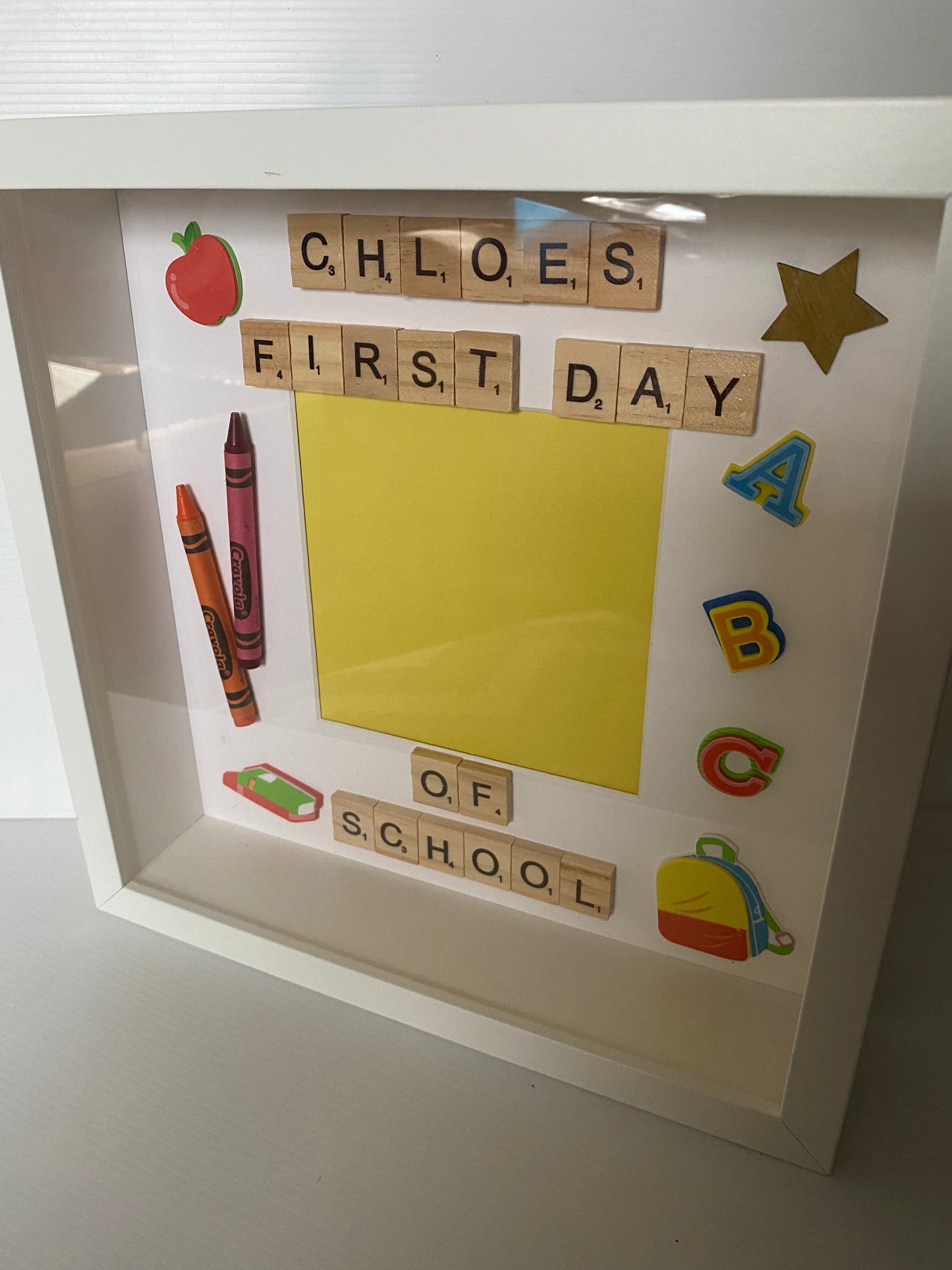 Personalised first day of school scrabble frame. With space for a photo and fun school themed embellishments. Handmade in Ireland